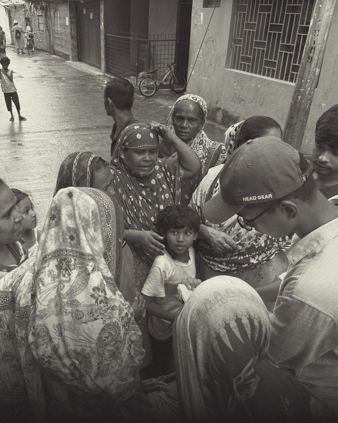 A volunteer handing a Basket of Hope package to a recipient