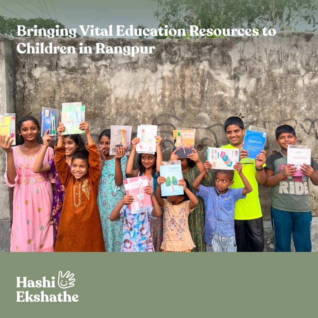 Children holding education and health resources in Rangpur